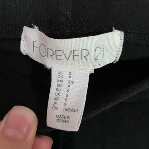 Two pairs of black leggings